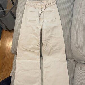 Cream high-rise jeans (wide leg)